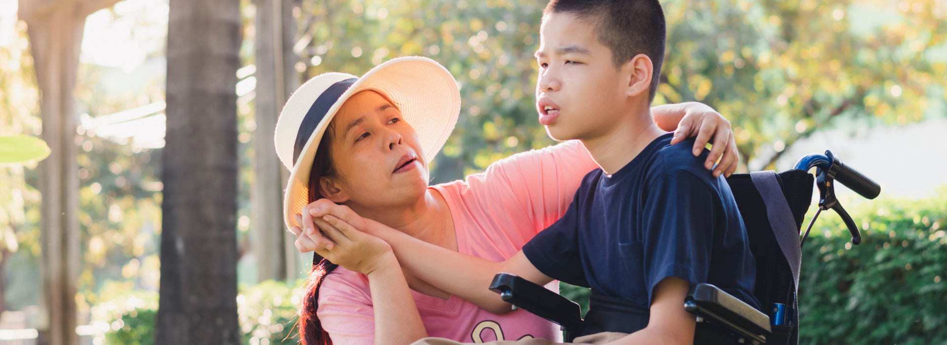 boy sitting on wheelchair