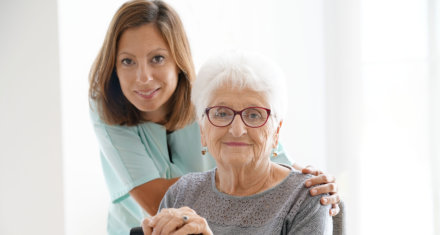 nurse smiling with senior