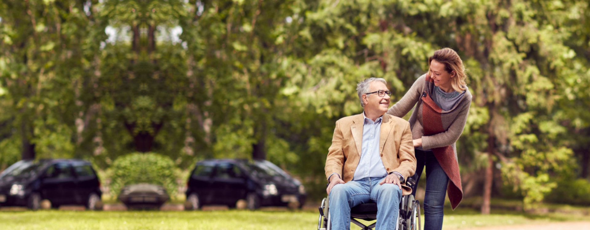 happy moment of a woman and a man on a wheelchair